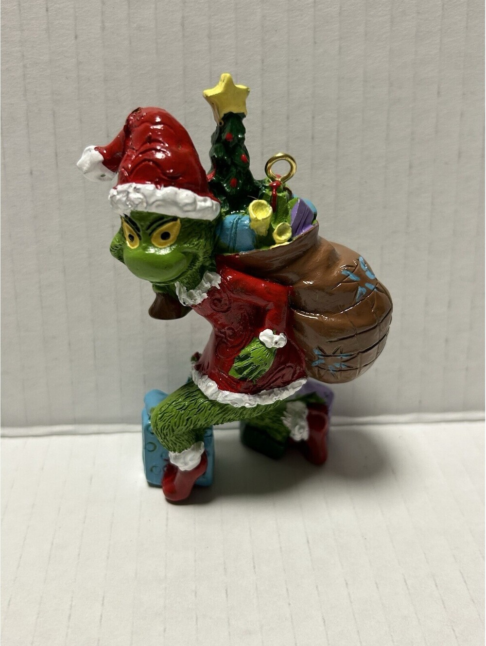 The Grinch Sneaking Tip Toeing Bag of Gifts Jim Shore Christmas Ornament